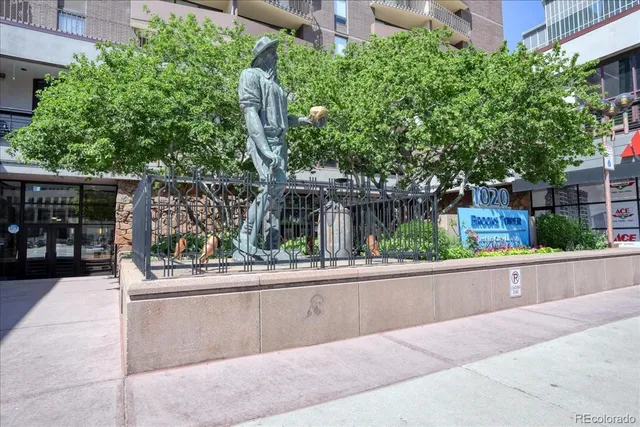 a swimming pool with outdoor seating and yard