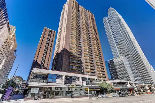 a view of tall buildings