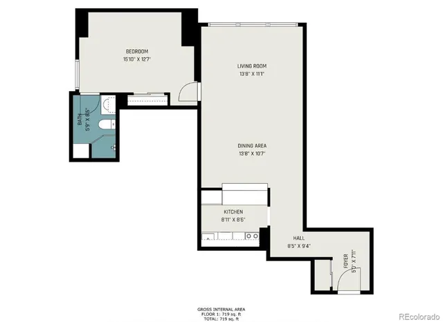 a kitchen with stainless steel appliances granite countertop a sink and a stove top oven with wooden floor