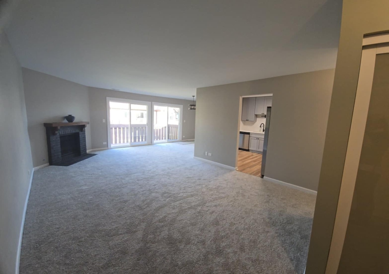 2860 Northampton Drive, Unit B2 Rolling Meadows, IL 60008 - Photo 11 of 22 a view of a big room with an empty room and a window