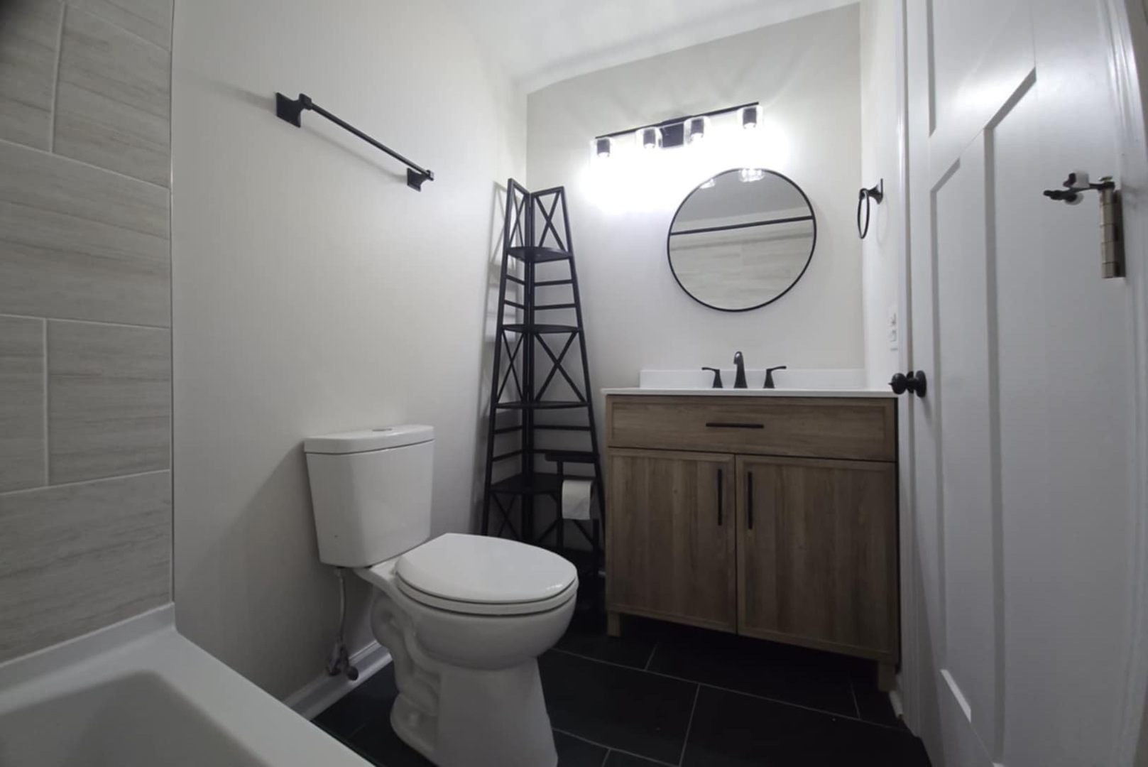 2860 Northampton Drive, Unit B2 Rolling Meadows, IL 60008 - Photo 14 of 22 a bathroom with a toilet a sink and mirror