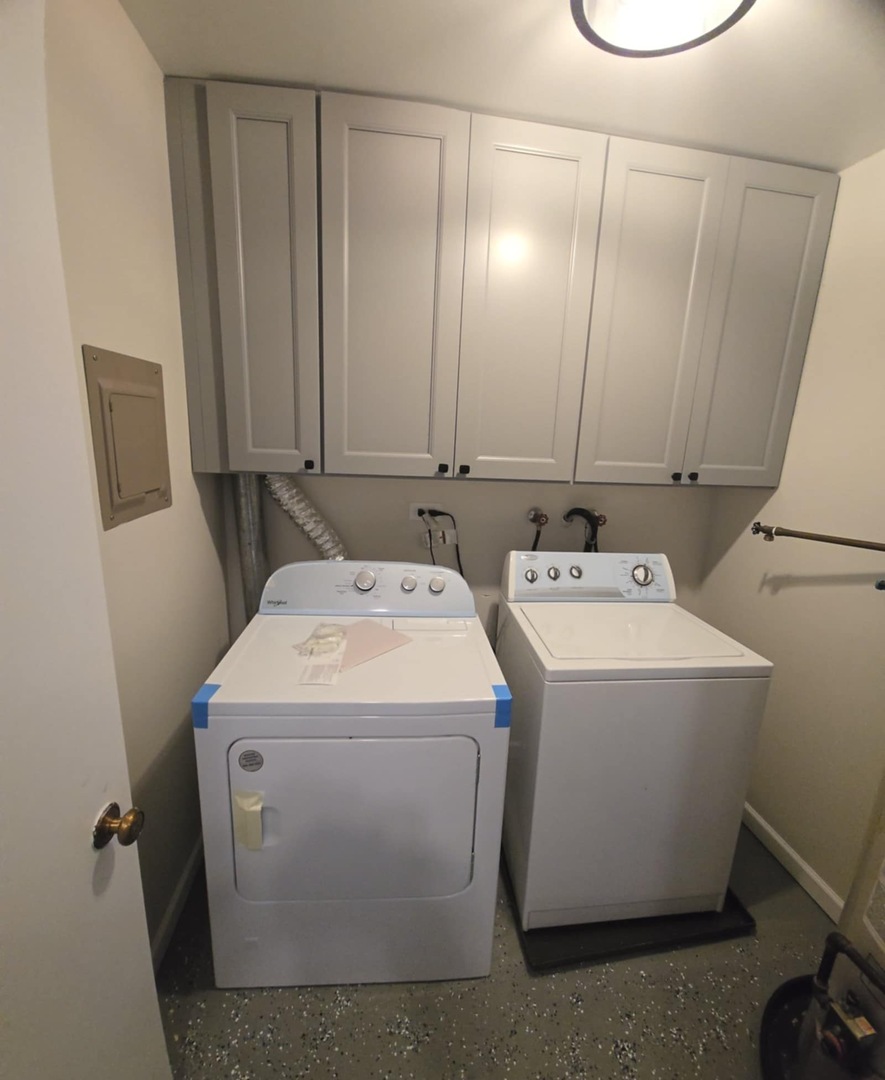 2860 Northampton Drive, Unit B2 Rolling Meadows, IL 60008 - Photo 19 of 22 a utility room with dryer and washer