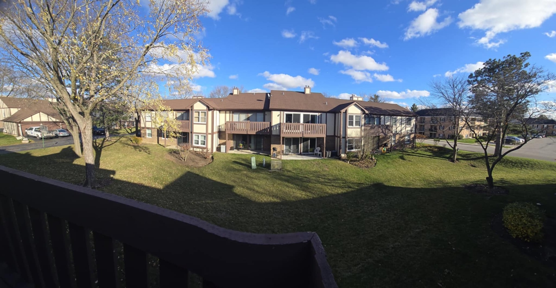 2860 Northampton Drive, Unit B2 Rolling Meadows, IL 60008 - Photo 20 of 22 a view of a house with a yard