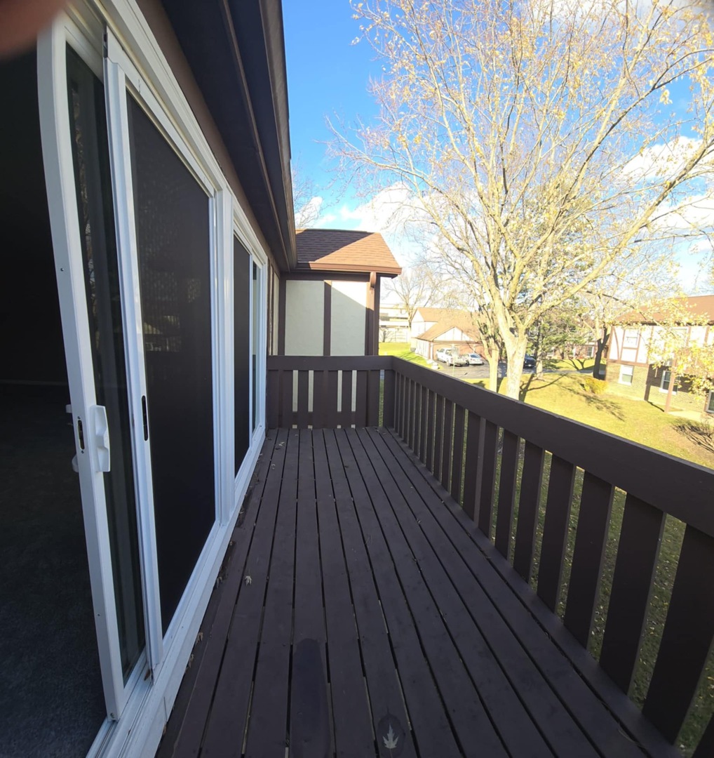 2860 Northampton Drive, Unit B2 Rolling Meadows, IL 60008 - Photo 21 of 22 a view of balcony with wooden floor