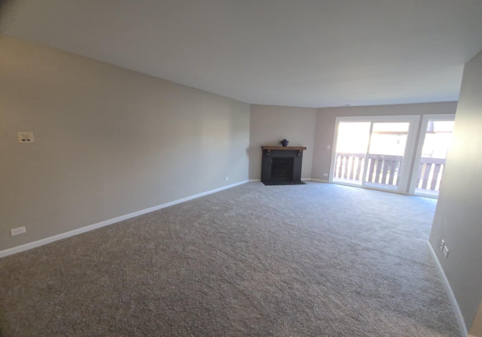 2860 Northampton Drive, Unit B2 Rolling Meadows, IL 60008 - Photo 10 of 22 a view of an empty room with a window