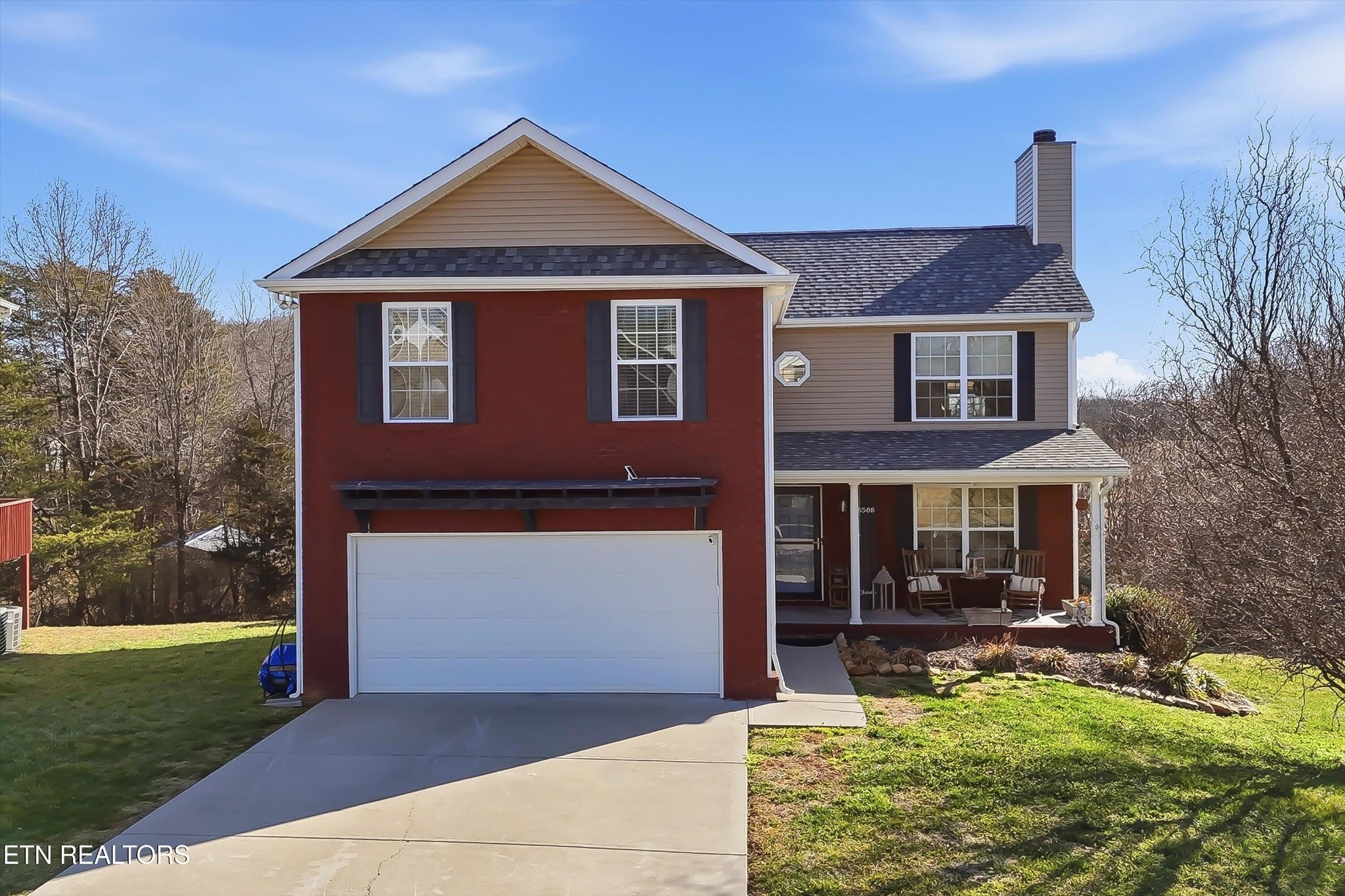 8508 Bowsong Lane Powell, TN 37849 - Photo 1 of 28 a front view of a house with garden