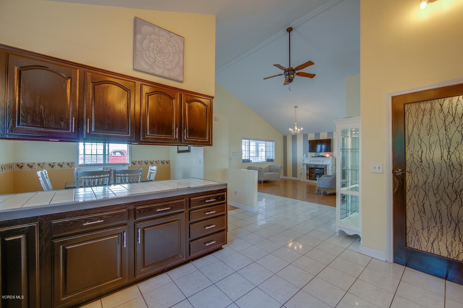 4265 Apricot Road Simi Valley, CA 93063 - Photo 13 of 39 a kitchen with stainless steel appliances granite countertop a refrigerator and a sink