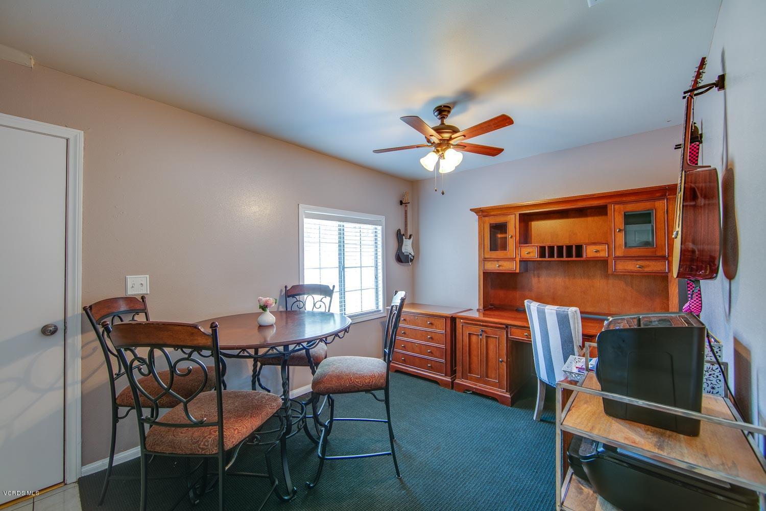 4265 Apricot Road Simi Valley, CA 93063 - Photo 16 of 39 a view of a dining room with furniture and a window