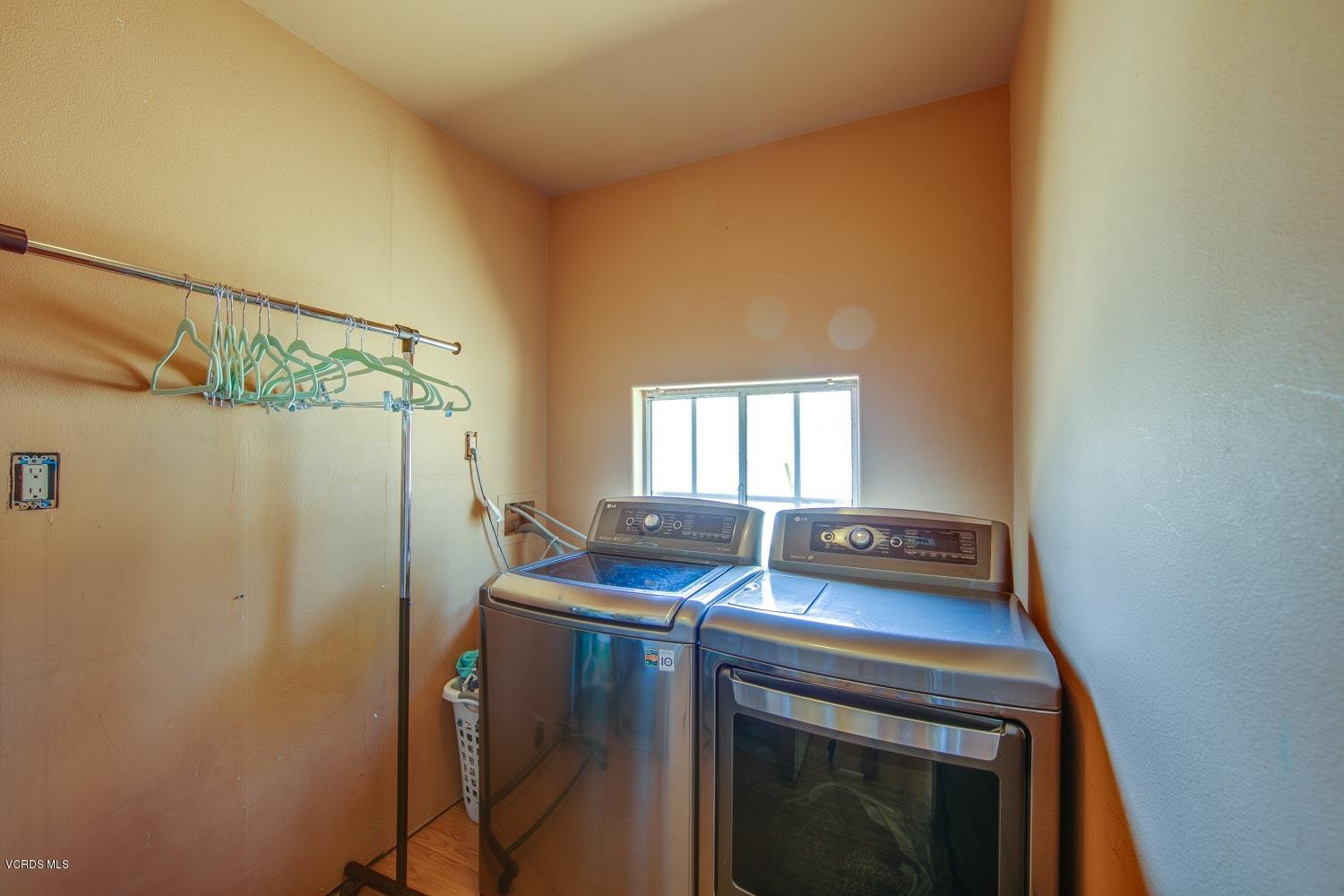 4265 Apricot Road Simi Valley, CA 93063 - Photo 17 of 39 a utility room with dryer and washer