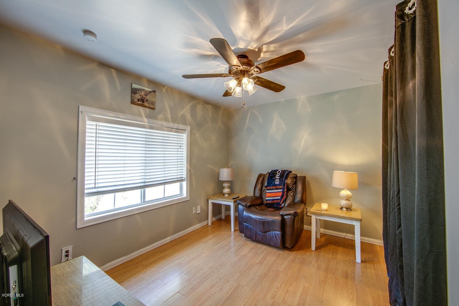 4265 Apricot Road Simi Valley, CA 93063 - Photo 18 of 39 a living room with furniture and a window
