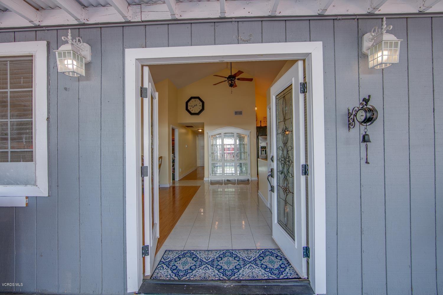 4265 Apricot Road Simi Valley, CA 93063 - Photo 3 of 39 a view of a hallway with wooden floor