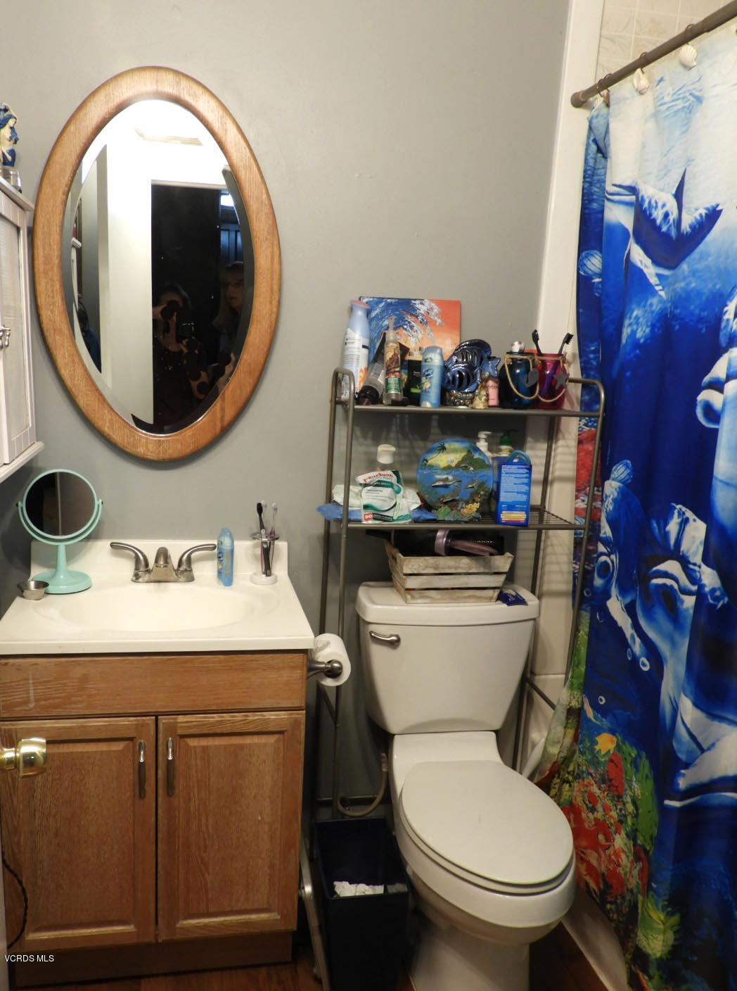 4265 Apricot Road Simi Valley, CA 93063 - Photo 39 of 39 a bathroom with a toilet and a sink