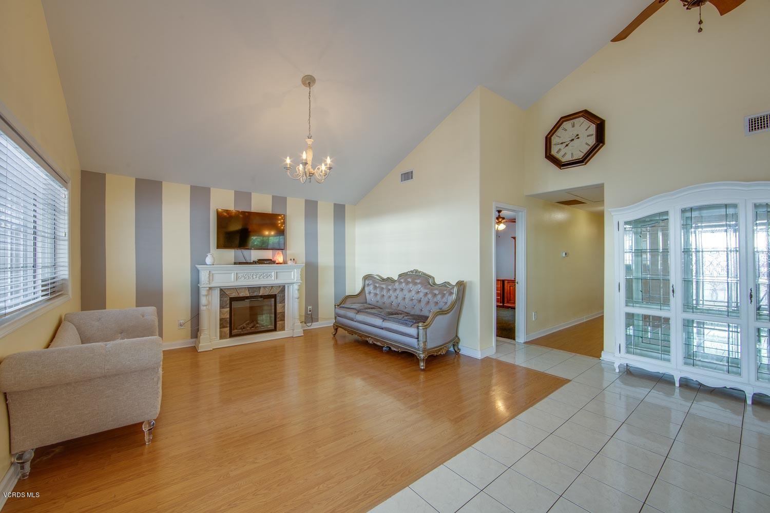 4265 Apricot Road Simi Valley, CA 93063 - Photo 5 of 39 a living room with furniture and a fireplace