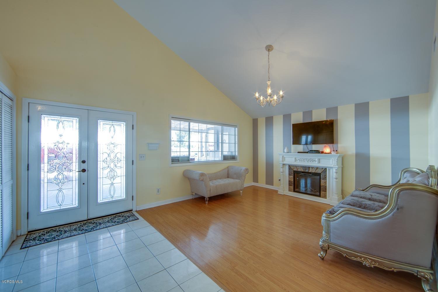 4265 Apricot Road Simi Valley, CA 93063 - Photo 6 of 39 a living room with furniture and a fireplace