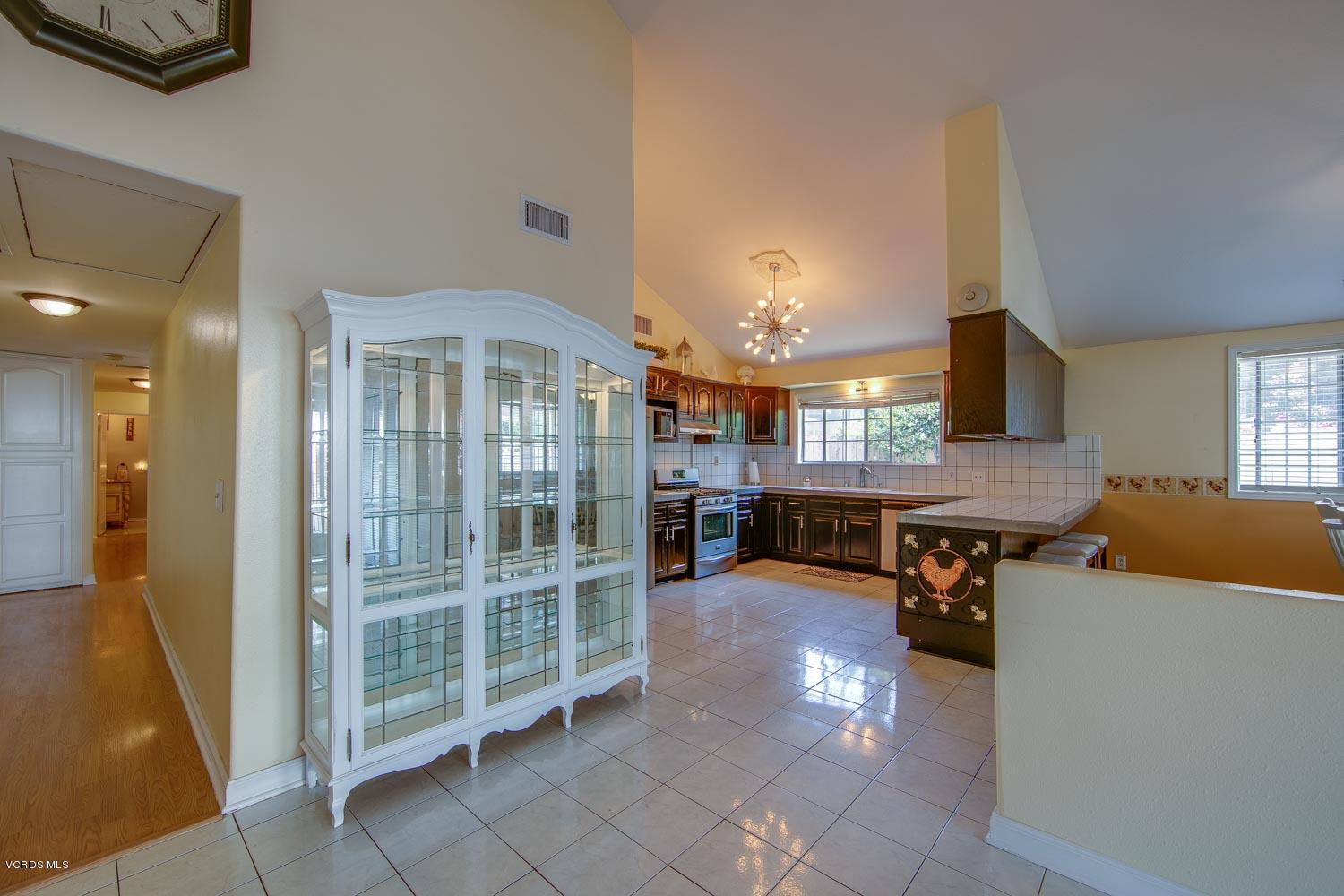 4265 Apricot Road Simi Valley, CA 93063 - Photo 8 of 39 a view of a livingroom with furniture and a kitchen