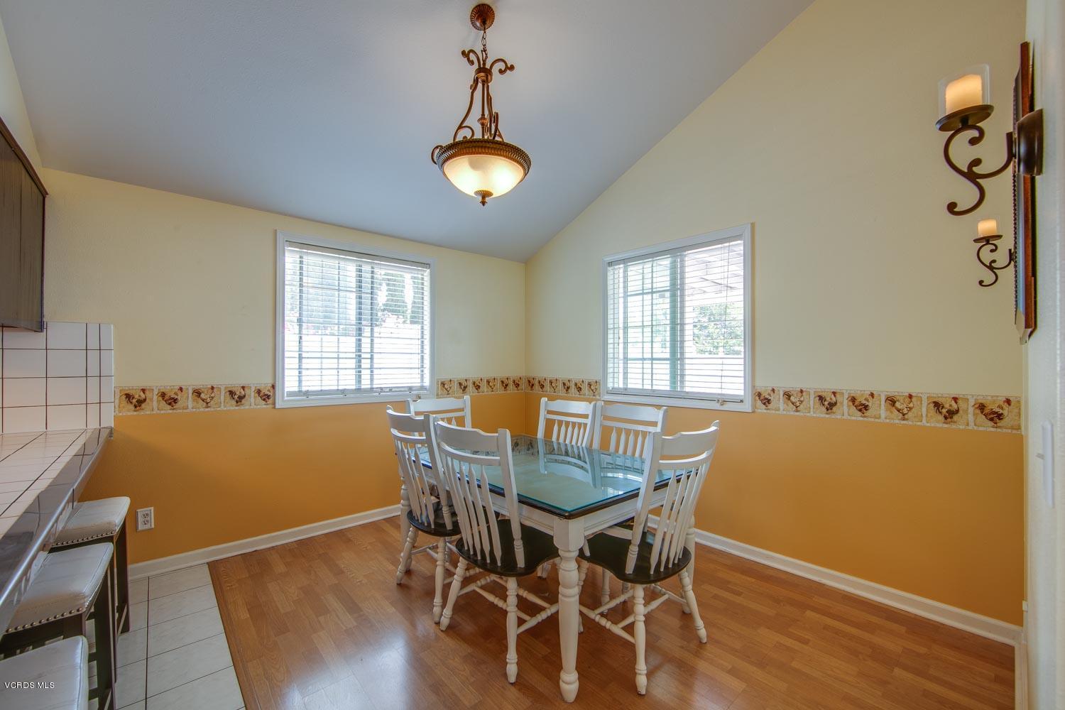 4265 Apricot Road Simi Valley, CA 93063 - Photo 10 of 39 a view of a dining room with furniture and wooden floor