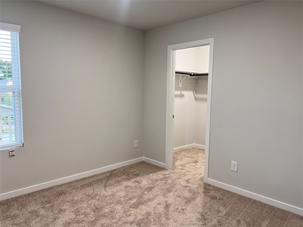 211 Brazen Forest Trail Magnolia, TX 77355 - Photo 8 of 11 an empty room with a window
