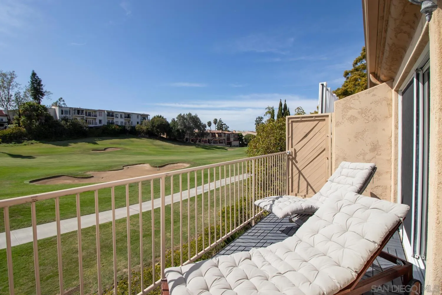 7517 Jerez Court, Unit B Carlsbad, CA 92009 - Photo 20 of 26 a view of a two chair near the ocean