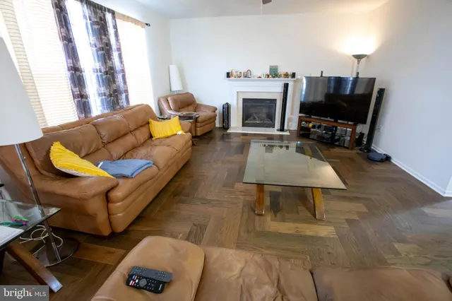 a kitchen with stainless steel appliances granite countertop a stove microwave and sink