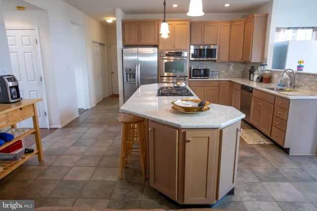 a view of a hallway with windows