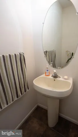 a room with a table and chairs