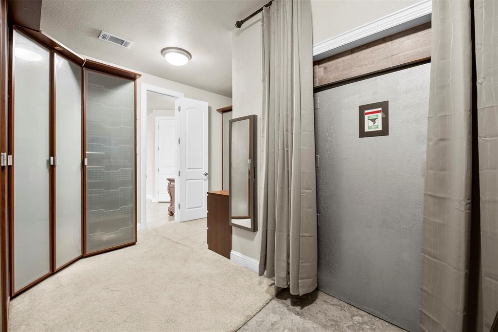 219 Mohundro Road Ferris, TX 75125 - Photo 23 of 40 a view of a hallway with a bathroom
