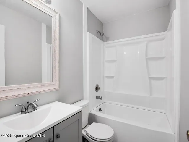 a bathroom with a sink toilet a bathtub and shower