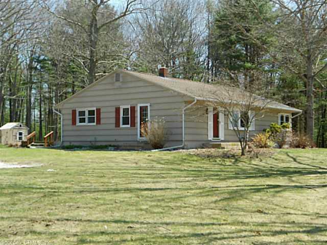 44 Lake Road Killingly, CT 06241 - Photo 1 of 1 a house that has a tree in front of it