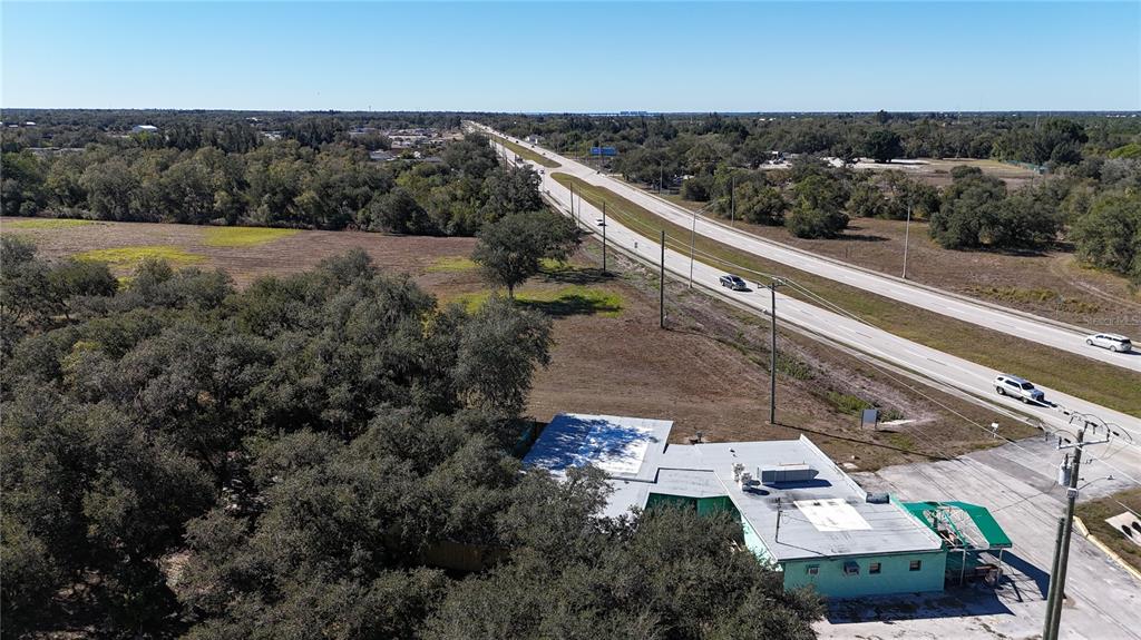 4224 Duncan Road Punta Gorda, FL 33982 - Photo 3 of 10 an aerial view of house with yard
