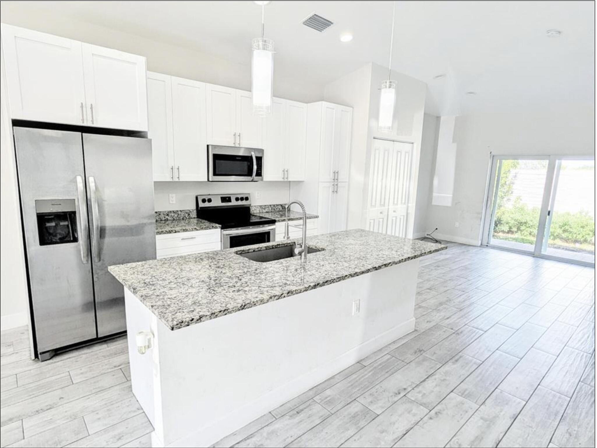 1562 West 26th Court Riviera Beach, FL 33404 - Photo 4 of 14 6
