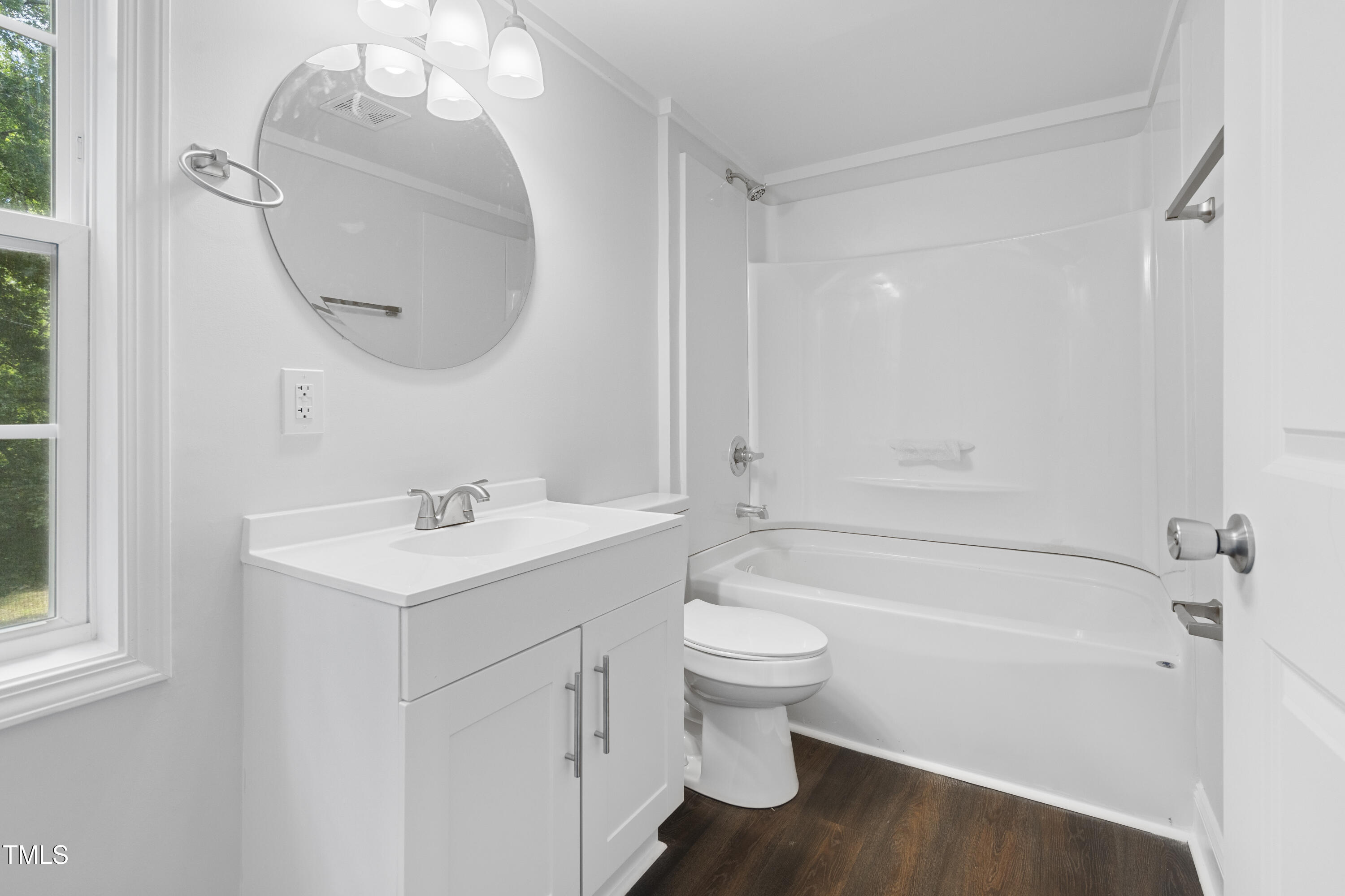 951 Walter Bright Road Sanford, NC 27330 - Photo 18 of 42 a bathroom with a sink a toilet and bathtub