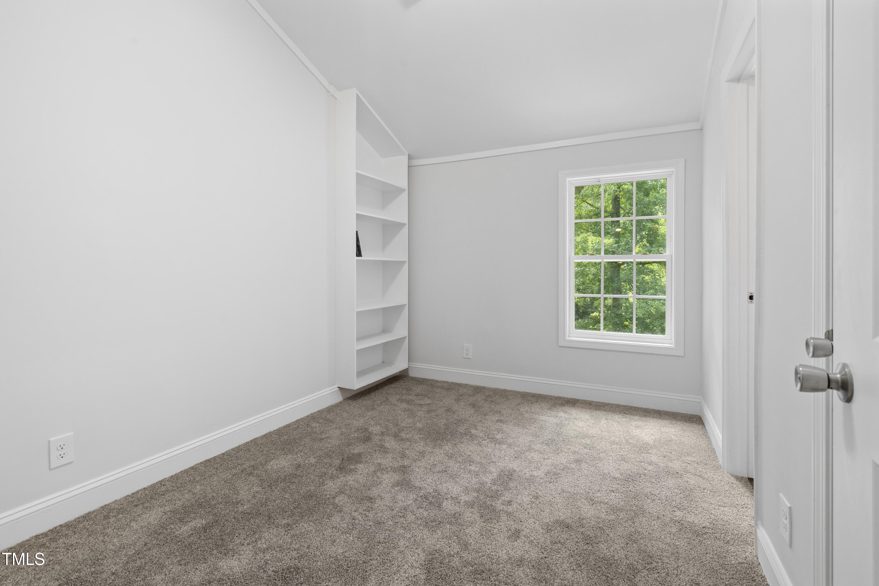 951 Walter Bright Road Sanford, NC 27330 - Photo 22 of 42 an empty room with windows