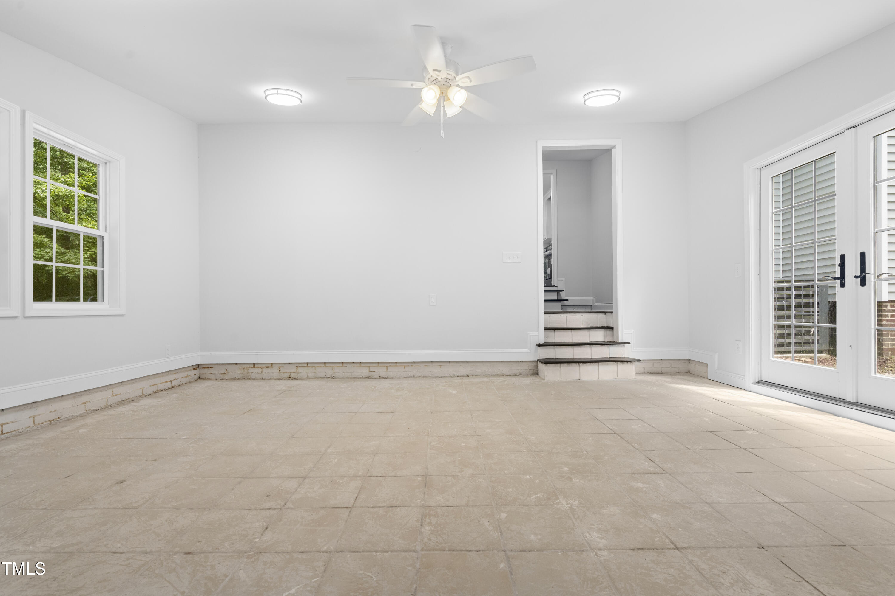 951 Walter Bright Road Sanford, NC 27330 - Photo 25 of 42 an empty room with a empty space and windows