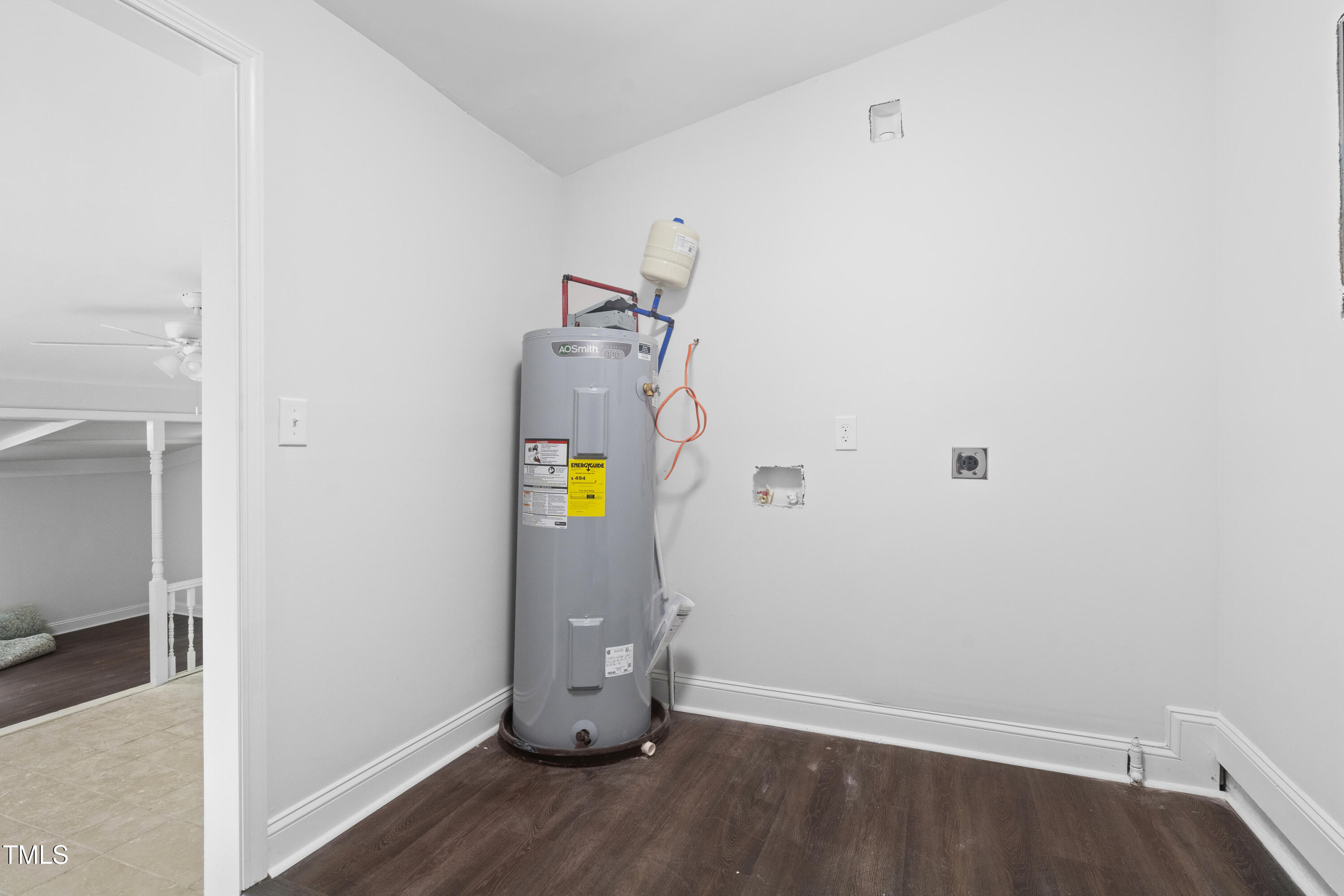 951 Walter Bright Road Sanford, NC 27330 - Photo 27 of 42 a view of storage and utility room with wooden floor