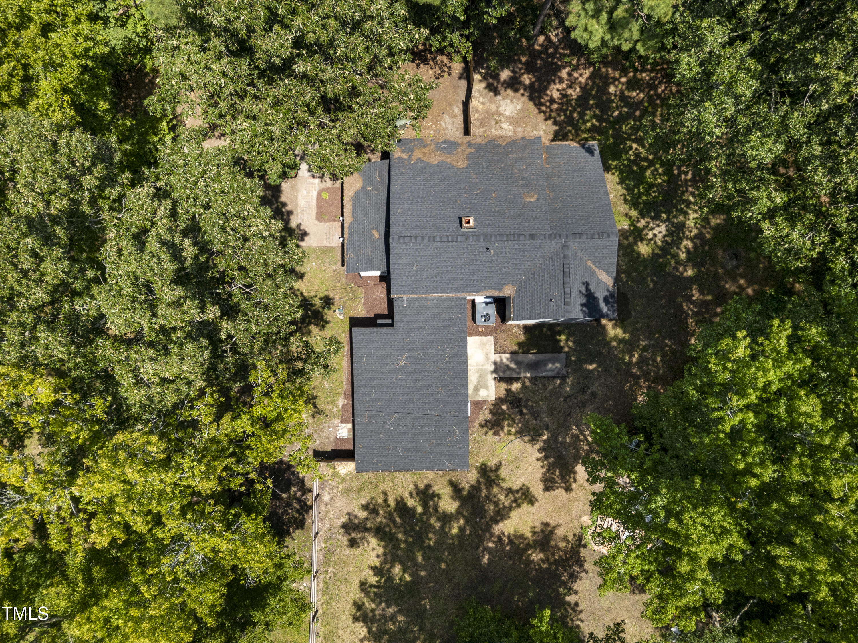 951 Walter Bright Road Sanford, NC 27330 - Photo 39 of 42 an aerial view of a house with a yard and large trees