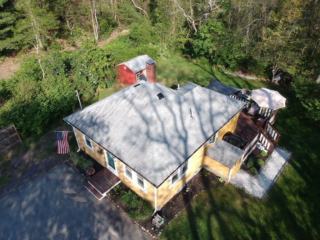 12 Fearing Hill Road Wareham, MA 02571 - Photo 2 of 22 a view of a small house with a yard