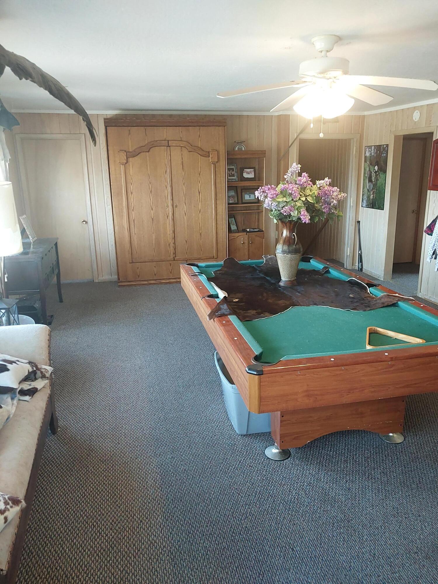 3900 Centerville Road Canby, CA 96015 - Photo 7 of 9 a room with pool table and windows
