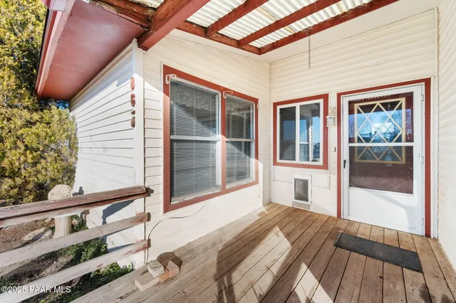 a view of a house with a large window