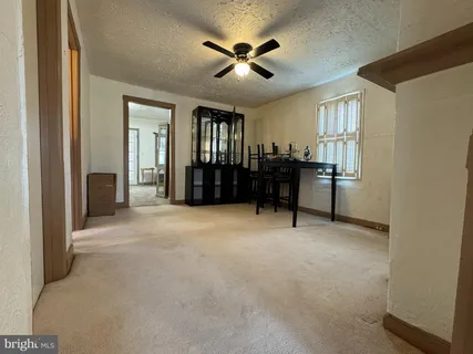 a view of workspace with furniture and windows