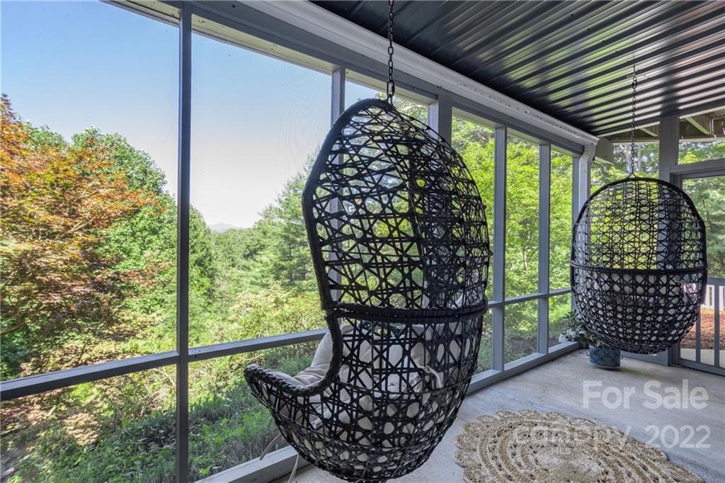 5531 Spring Road Hendersonville, NC 28739 - Photo 6 of 48 a view of a porch