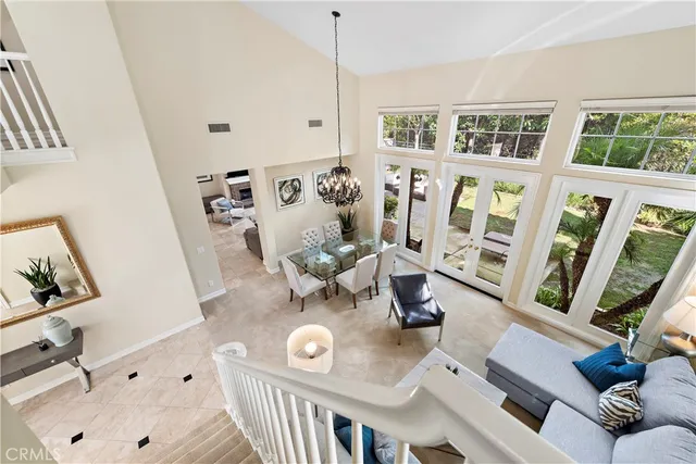 a view of living room with furniture and wooden floor