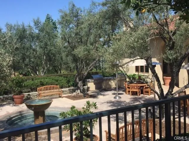 a view of an outdoor sitting area with furniture
