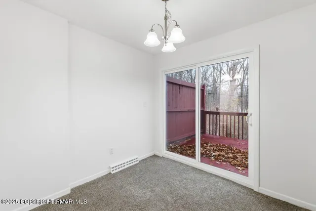 a view of a room with a large window