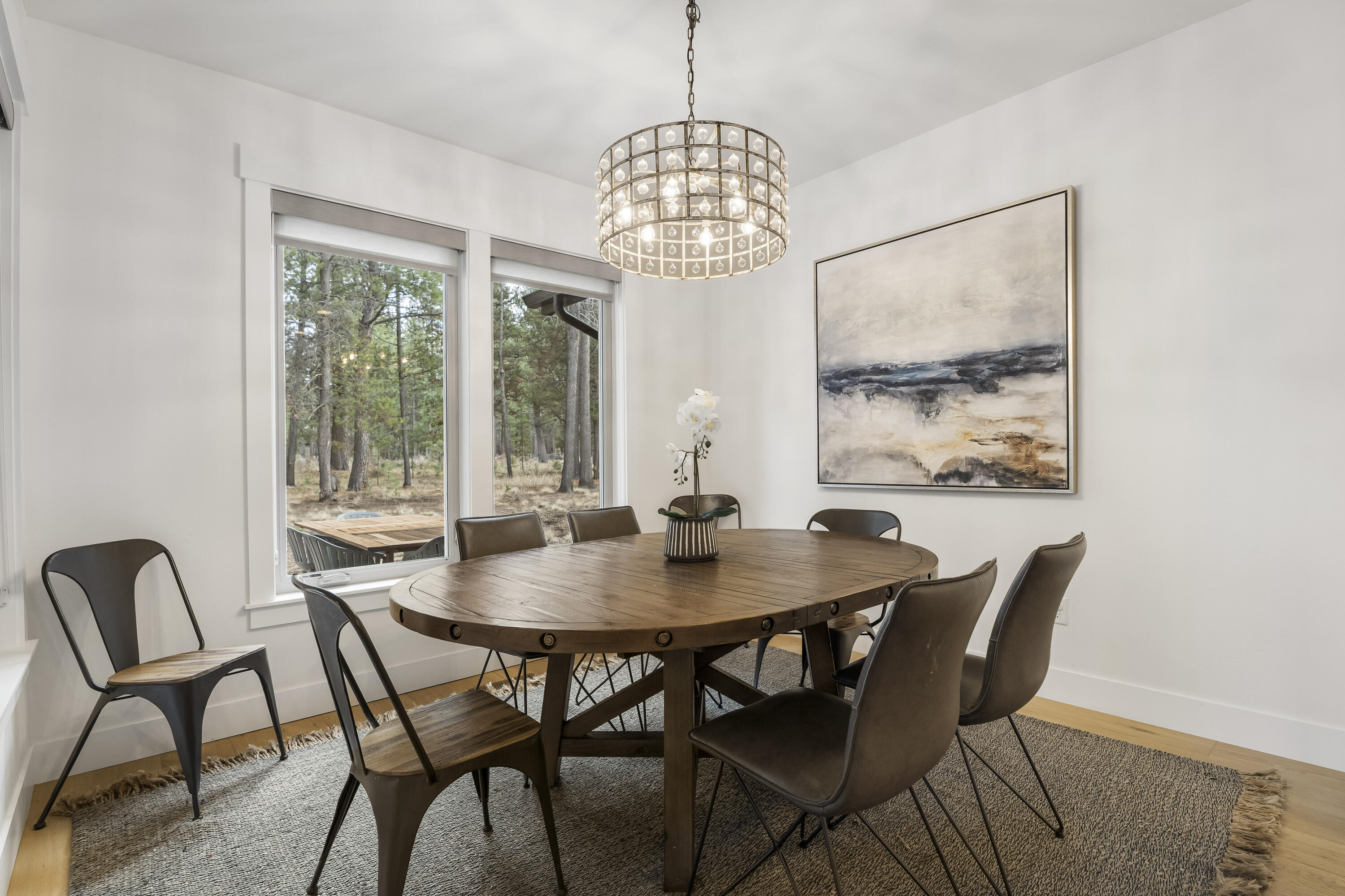 56302 Sable Rock Loop, Unit 255 Bend, OR 97707 - Photo 13 of 65 a view of a dining room with furniture window and outside view