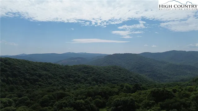 a view of lake with mountain
