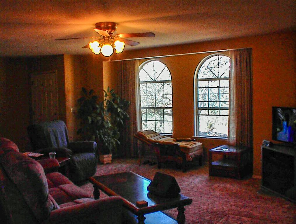 32860 George Smith Road Squaw Valley, CA 93675 - Photo 11 of 35 a living room with furniture and a large window