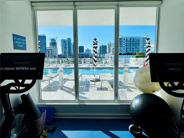 a room with furniture and flat screen tv