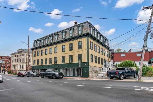 a view of a building with a street
