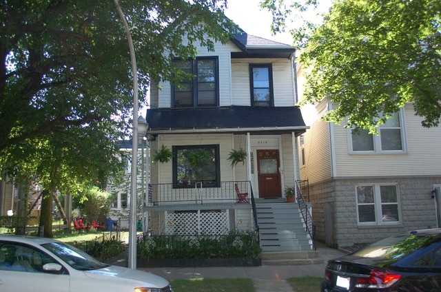3414 North Seminary Avenue Chicago, IL 60657 - Photo 1 of 14 a front view of a house with a yard