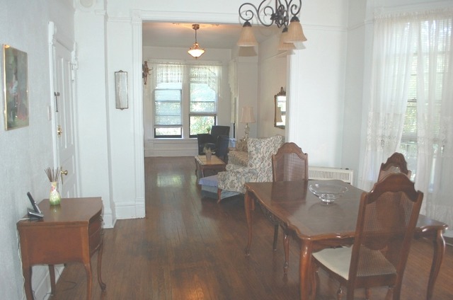 3414 North Seminary Avenue Chicago, IL 60657 - Photo 11 of 14 a view of a dining room with furniture and wooden floor